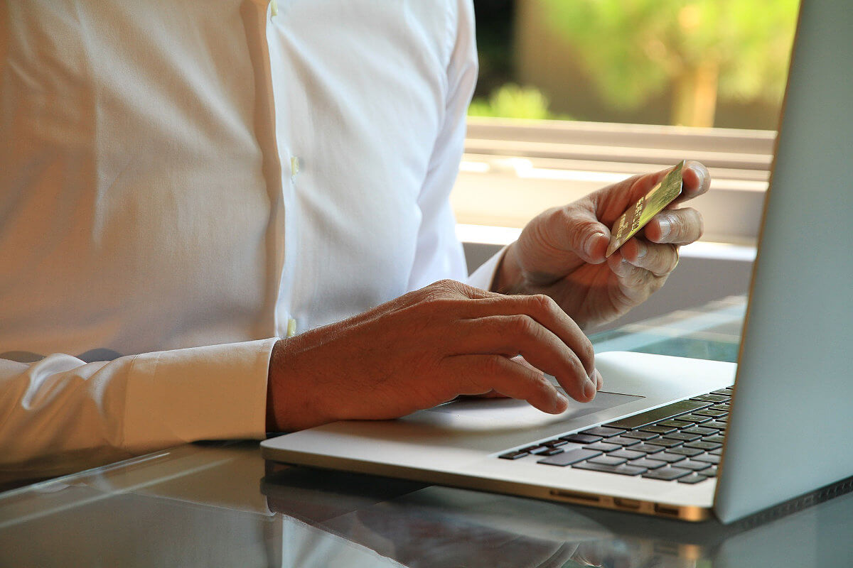 Man checking his cloud-powered data portal on a phone